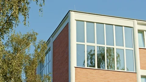 Zlin - Typical Bata Building - Brickwork, Glass and Trees Vídeo Stock 115836488