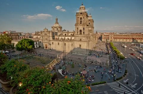 The zocalo in mexico city with the cathedral and giant flag in the centre Stock Photos