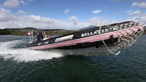 Zodiac boat pulls up to dock Stock Footage 50963087