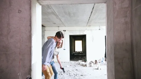 A zombie attack in abandoned building. Tired survivors holding by each other and Stock Footage 110739547
