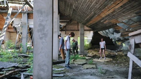 A zombie attack on the top floor of abandoned building. Survived woman with a Stock Footage 110738254