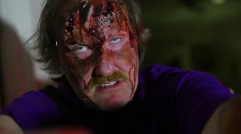 Zombie attacking inside zombified man Stock Footage 62902338