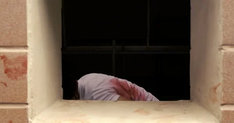 Zombie characters ghost woman bite human in wall horror halloween  Video stock 138415544