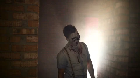 Zombie goes to the camera Video stock 68693424