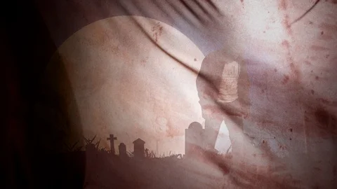 Zombie in Graveyard Staring Through Cloth 4K Video stock 96084808