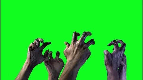 Zombie hand on a green background on Halloween Stock Footage