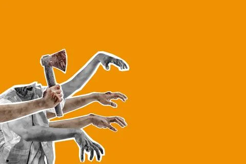 A zombie hand holding an axe is shown on an orange background Stock Photos
