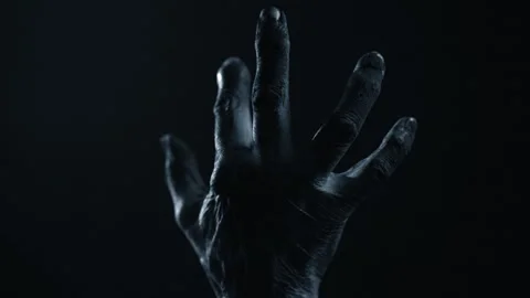 Zombie Hand Moving in Darkness Stock Footage 312475827