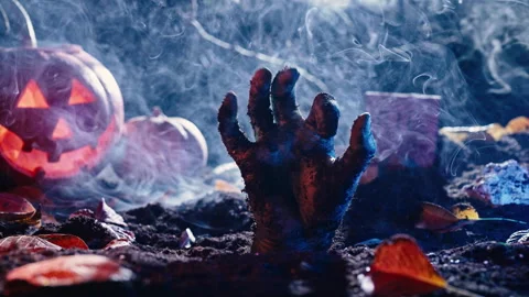 Zombie Hand waving hello, hi. Horrible resurgence scene. Footage scary halloween Stock Footage 253997469