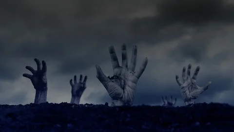Zombie Hands emerging from the Ground Stock Footage