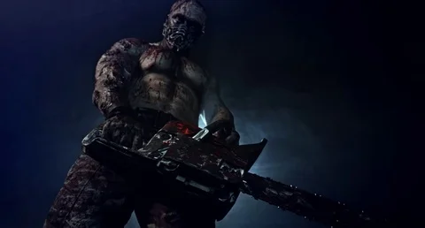 Zombie killer with a chainsaw.  Apocalypse. 库存影片 70937298