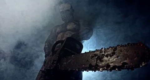Zombie killer with a chainsaw.  Apocalypse. 動画素材 70937620