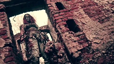 Zombie killer stands on the ruins of the city. Stock Footage 75207953