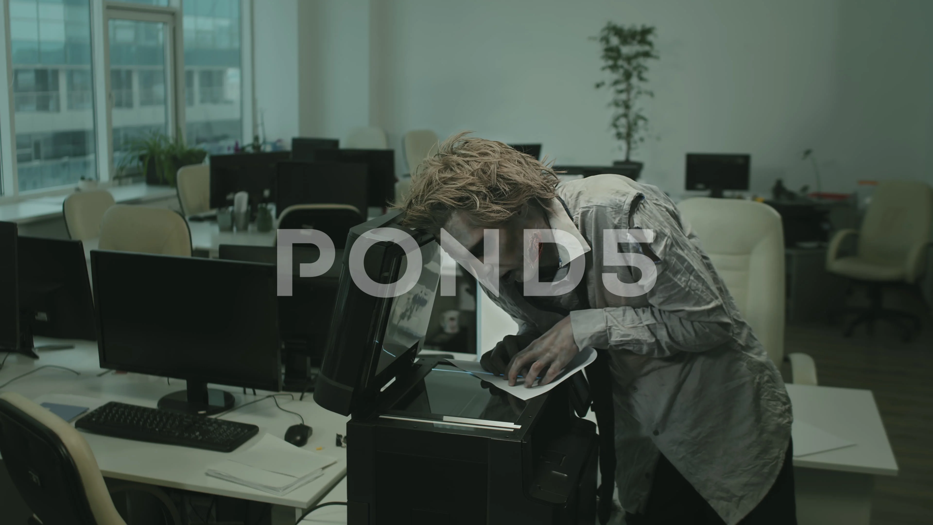 Zombie Office Worker Using Copier | Stock Video | Pond5