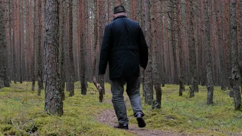 Zombie in scary skeleton mask walking in forest. Stock-Footage 154475412