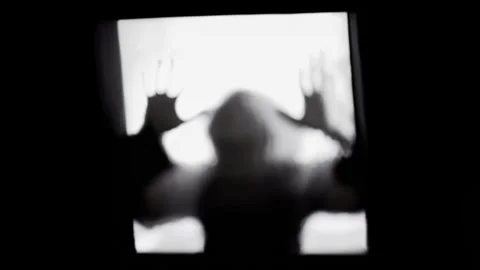 Zombie shadow window glass hit zoom flicker Stock Footage 261390934