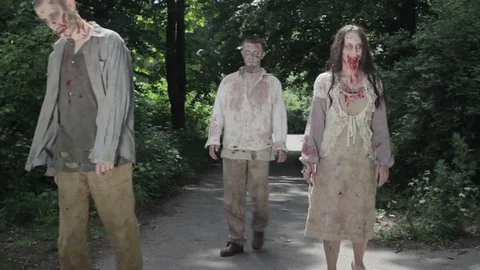 Zombies are walking through an abandoned village. Stock Footage 77443439