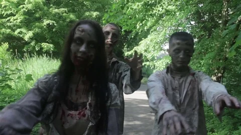 Zombies are walking through an abandoned village. Stock Footage 77462634