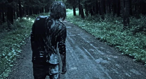 Zombies are walking through the woods. Vídeos de archivo 66841956