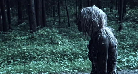 Zombies are walking through the woods. 库存影片 66856251
