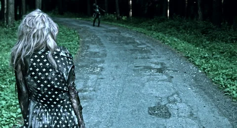Zombies are walking through the woods. Video stock 66858849