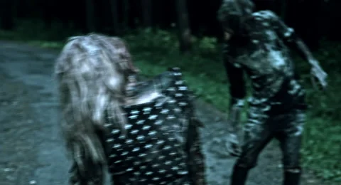 Zombies are walking through the woods. Stock Footage 66859873