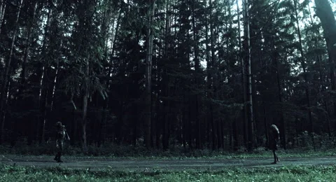 Zombies are walking through the woods. Vídeos de archivo 66861696