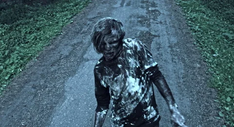 Zombies are walking through the woods. Video stock 66863933