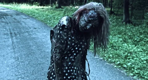Zombies are walking through the woods. 库存影片 66865566