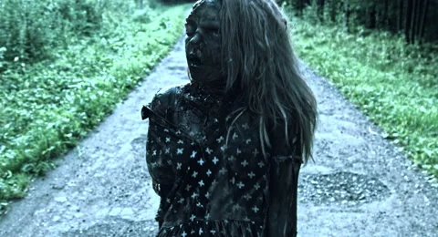 Zombies are walking through the woods. Video stock 66871725