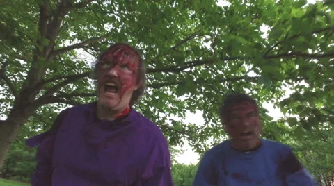 Zombies around trees zombie attack Stock Footage 62903067