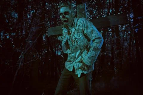 Zombies risen in the night cemetery. Halloween. Thriller. Stock Photos