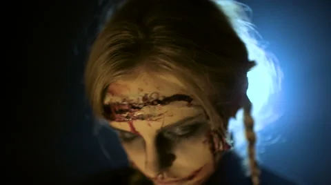Zombies with sliced person Video stock 68694216
