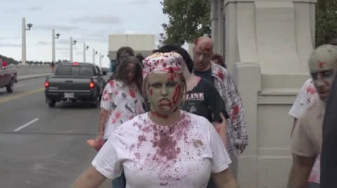Zombies walk by 2 Stock Footage 12608516