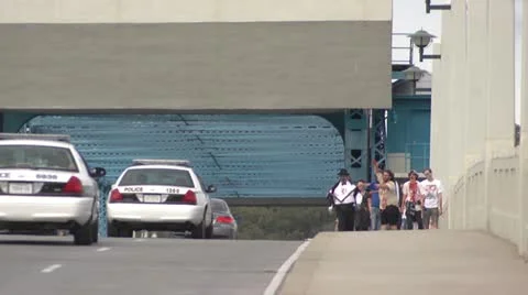 Zombies walking over bridge Stock Footage 12608336