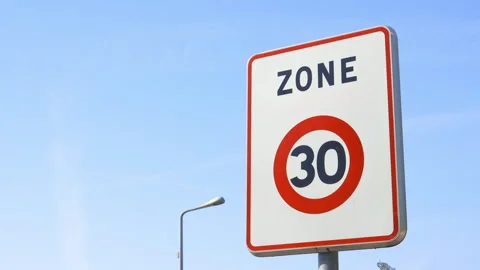 Zone 30 road sign, indicating the limit zone of thirty kilometers per hour Stock Footage 257326744