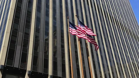 Zoom-In To 3 American Flags Flanking Office Building Stock Footage 168334162