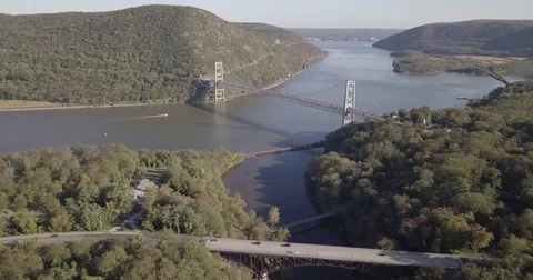 Zoom in air view of Bear Mountain bridge Stock Footage 81229996