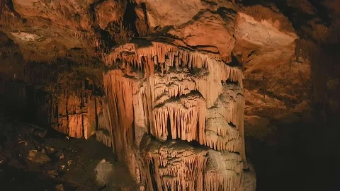 Zoom in to ancient rock formation drapes on the wall of Saeva Cave, Bulgaria Stock Footage 86333779