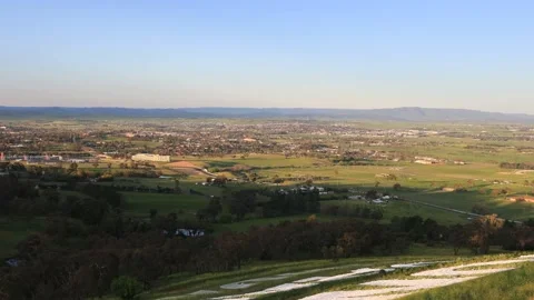 Zoom in to Bathurst city from Mt Panorama over motorsport racing track as 4k. Stock Footage 141822599
