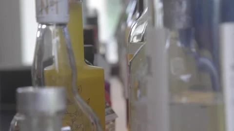 Zoom between bottles 스톡 동영상 163442874