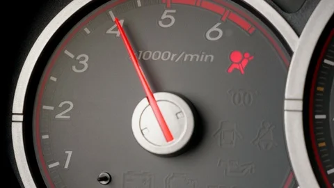Zoom in black car dial panel tachometer and moving pointer on it. Close up 4k 動画素材 112718753