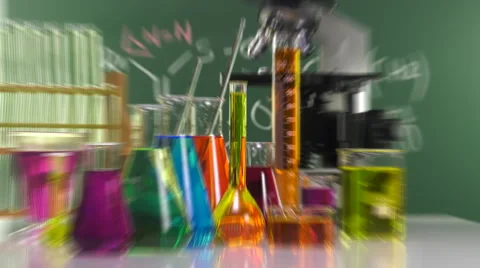 Zoom in on a bottle filled with yellow liquid Video stock 64291613