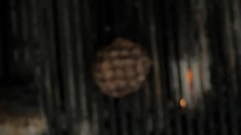 Zoom in on burger on grill Stock Footage 121168206