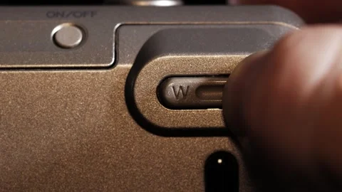 Zoom Button Press On Silver Point And Shoot Stock Footage 321279075