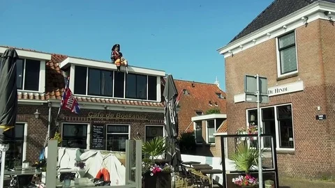 Zoom In on captain Hook on the roof Stock Footage 84099219
