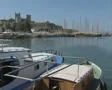Zoom in to castle overlooking harbour SD Footage
