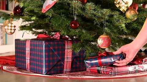 Zoom in on christmas tree with lots of presents Stock Footage 116011658
