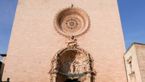 A zoom in clip of the front of the basilica de sant francesc on mallorca Stock Footage 272406851