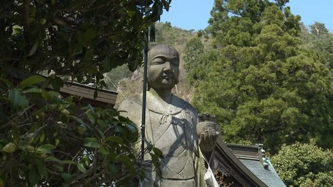 Zoom to close up on statue of Kobo Daishi at Okubo-ji temple Stock Footage 86758853